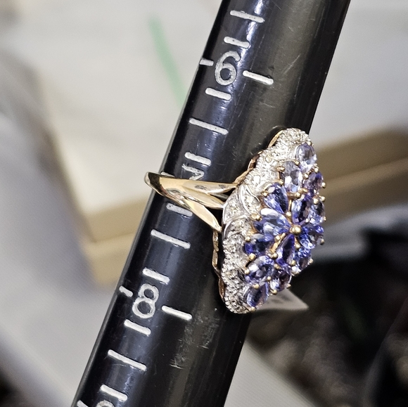 New. 10k tanzanite & diamond ring size 7. Can be resized by a jeweler. Stamped 1 - Picture 6 of 9